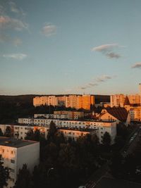 High angle view of buildings in city against sky