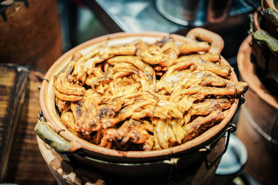 High angle view of meat in container on table