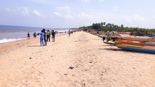 Rear view of people on beach