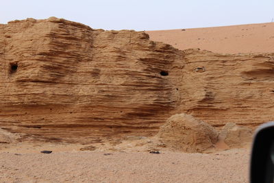 Scenic view of desert against clear sky