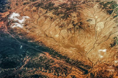 High angle view of trees on mountain against sky