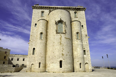 Low angle view of historic building against sky