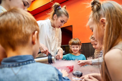 Teachers and kids having food