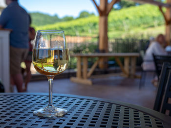 Glass of wine on table in restaurant