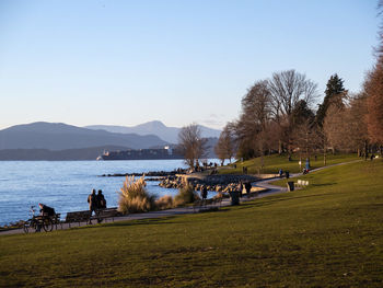 English bay beach seawall on a sunny afternoon in vancouver