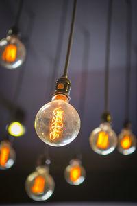 Low angle view of illuminated light bulb