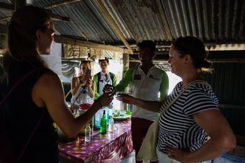 GROUP OF PEOPLE DRINKING GLASS