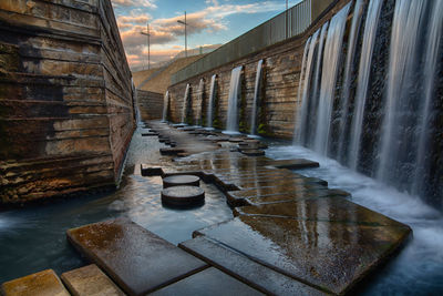 Scenic view of dam against sky