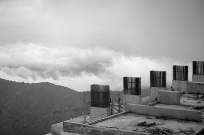 High angle view of buildings in city against sky