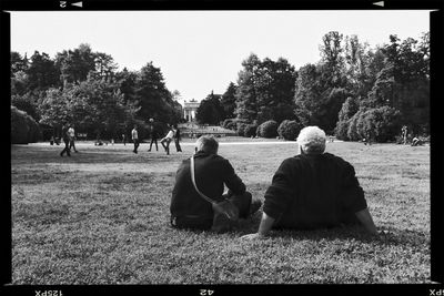 People relaxing in park