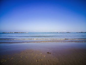 Scenic view of sea against clear sky