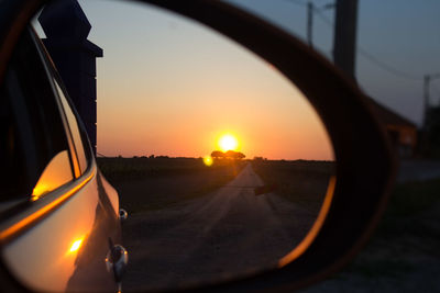 Sunset seen through car window