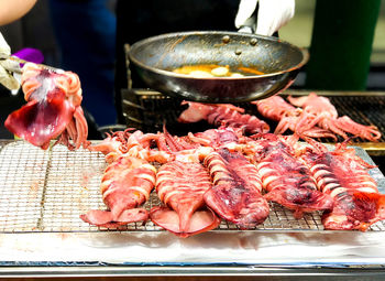 Close-up of meat on barbecue grill