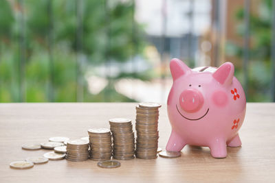 Close-up of coins on table