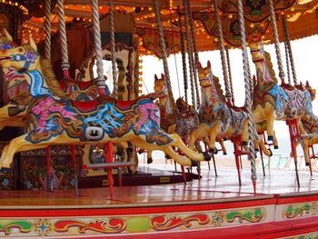 Low angle view of carousel at amusement park