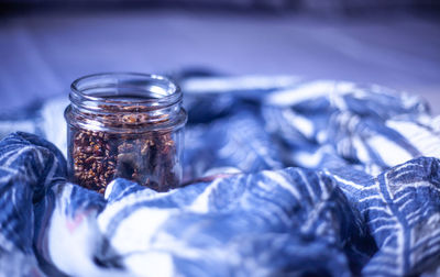 Close-up of glass of jar on table