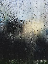 Close-up of water drops on glass