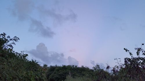 Scenic view of mountain against cloudy sky