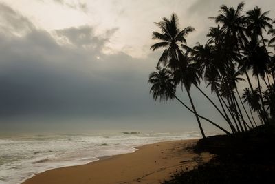 Scenic view of sea against sky at sunset