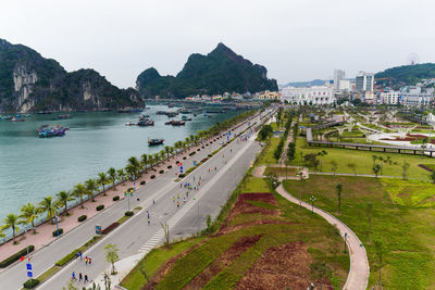 High angle view of road by sea in city