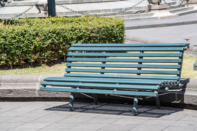 Empty bench in park