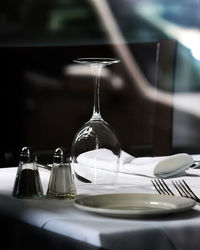 Upside down of glass on table