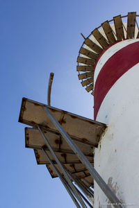 Low angle view of built structure against blue sky
