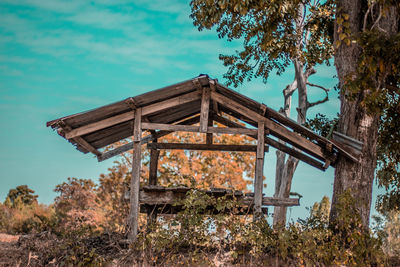 Abandoned building against blue sky