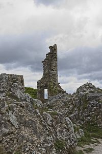 Low angle view of old building against sky