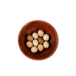 High angle view of eggs in bowl against white background