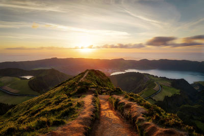 Scenic view of landscape against sky during sunset