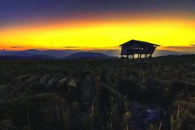 Scenic view of landscape at sunset