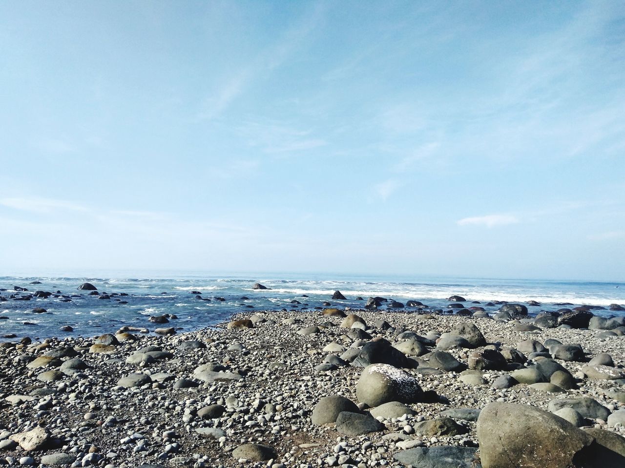 sea, water, sky, beach, scenics - nature, land, beauty in nature, horizon over water, solid, horizon, rock, tranquil scene, nature, tranquility, no people, rock - object, day, cloud - sky, outdoors, rocky coastline