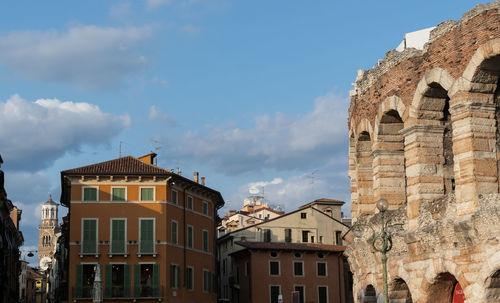 Low angle view of historical building against cloudy sky