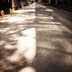 Shadow of sunlight on ground