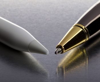 Close-up pens on table