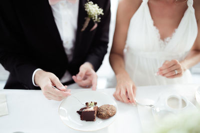 Close-up of woman eating food