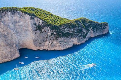 High angle view of rock formation in sea