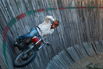 High angle view of man riding bicycle