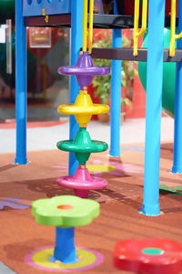 Close-up of multi colored equipment in playground