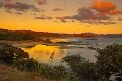 Scenic view of sea against sky during sunset