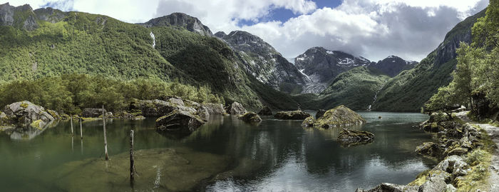 Panoramic view of lake and mountains against sky