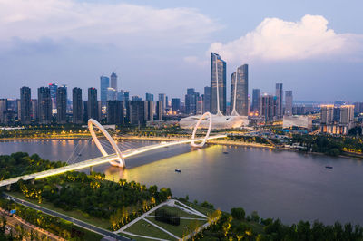 Aerial view of modern buildings in city against sky