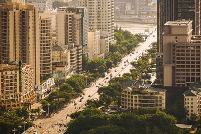 High angle view of street amidst buildings in city