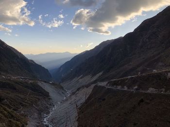 Scenic view of mountains against sky during sunset