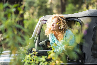 Woman sitting in car