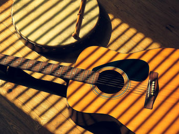 High angle view of guitar on table