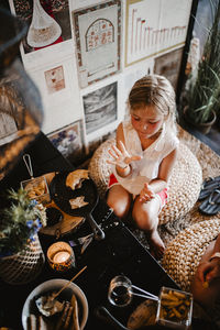 Girl sitting in restaurant