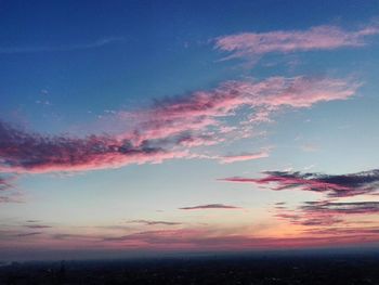 Low angle view of dramatic sky during sunset