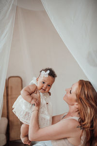 Mother and daughter at home